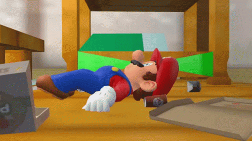 A Cartoon Of Mario Laying On The Floor Next To A Box Of Pizza GIF
