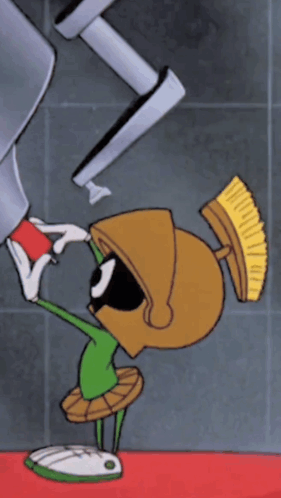 A Cartoon Of Marvin The Martian With A Broom GIF
