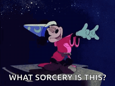 A Cartoon Of Mickey Mouse As A Wizard With The Words `` What Sorcery Is This ? '' GIF
