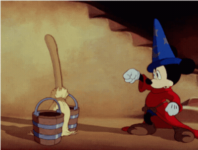 A Cartoon Of Mickey Mouse In A Wizard Outfit GIF
