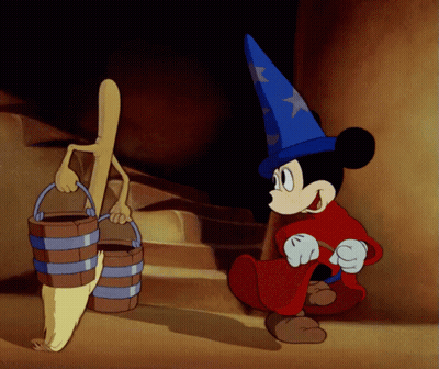A Cartoon Of Mickey Mouse In A Wizard Outfit GIF
