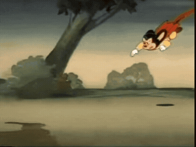 A Cartoon Of Mickey Mouse Is Flying Through The Air GIF