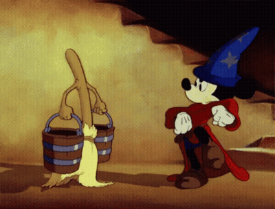 A Cartoon Of Mickey Mouse Standing Next To A Bucket And A Broom GIF
