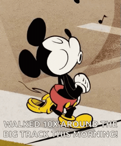A Cartoon Of Mickey Mouse Walking Down A Sidewalk With The Caption " Walked 10X Around The Big Track This Morning ! " GIF