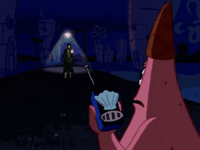 A Cartoon Of Patrick Holding An Ice Cream Cone With The Words He 'S Just Standing There GIF