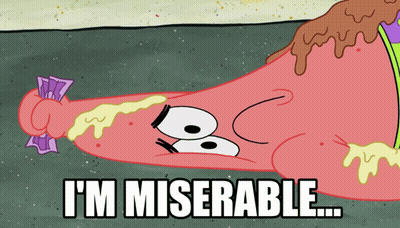 A Cartoon Of Patrick Star Laying On The Ground With The Words I 'M Miserable GIF