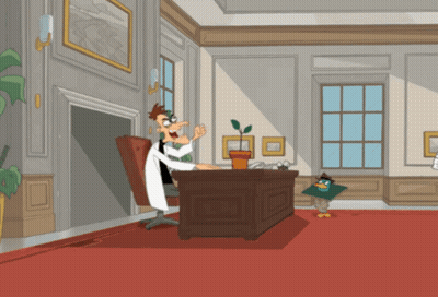 A Cartoon Of Perry The Platypus Sitting At A Desk With A Plant GIF