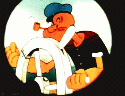 A Cartoon Of Popeye Holding A Steering Wheel GIF