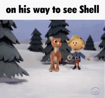 A Cartoon Of Rudolph The Red Nosed Reindeer Standing Next To An Elf In The Snow GIF