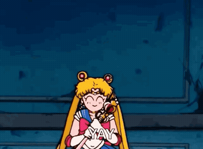 A Cartoon Of Sailor Moon Is Kneeling Down And Holding A Wand And Saying Yay . GIF