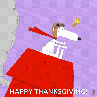 A Cartoon Of Snoopy Flying In The Air With The Words Happy Thanksgiving Below Him GIF