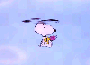 A Cartoon Of Snoopy Flying Through The Air GIF