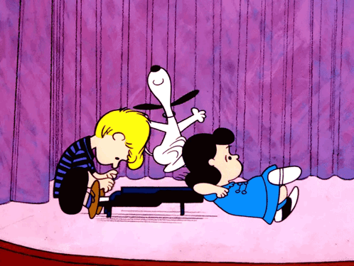 A Cartoon Of Snoopy Playing A Piano With Lucy Laying On The Floor GIF