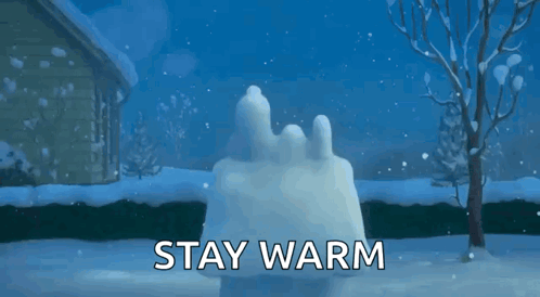 A Cartoon Of Snoopy Sitting On Top Of A Snow Sculpture With The Words " Stay Warm " Below Him GIF