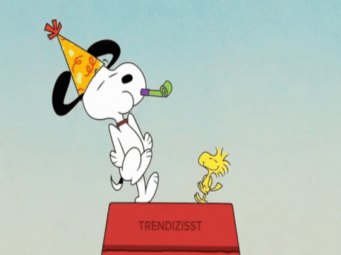 A Cartoon Of Snoopy Wearing A Party Hat Standing On A Box With Trendizisst Written On It GIF