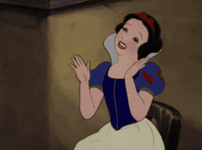 A Cartoon Of Snow White Sitting On A Chair GIF