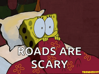A Cartoon Of Spongebob Laying In Bed With The Words Roads Are Scary Above Him GIF