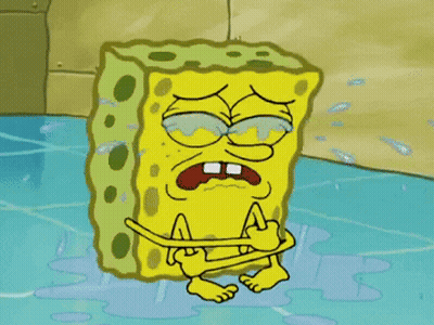 A Cartoon Of Spongebob Sitting In A Puddle Of Water Crying GIF