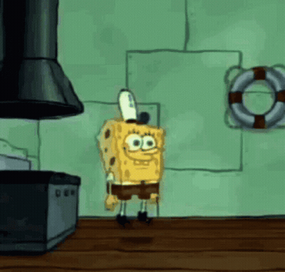 A Cartoon Of Spongebob Squarepants Standing In A Kitchen . GIF