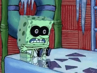 A Cartoon Of Spongebob Wearing A Mask Sitting On A Bed GIF