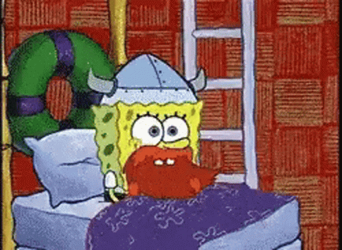 A Cartoon Of Spongebob Wearing A Viking Hat Laying In Bed GIF