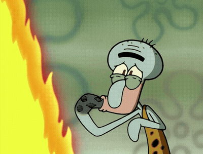 A Cartoon Of Squidward From Spongebob Squarepants Eating A Cookie GIF