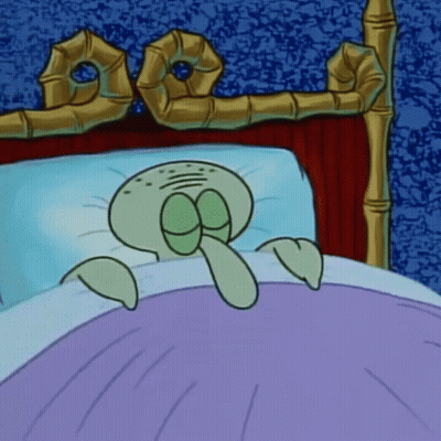 A Cartoon Of Squidward From Spongebob Squarepants Laying In A Bed GIF