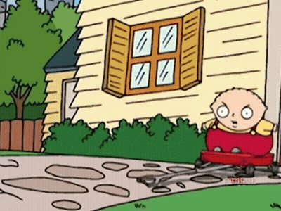 A Cartoon Of Stewie Griffin Driving A Red Toy Car GIF