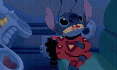 A Cartoon Of Stitch Holding A Red Light In His Mouth GIF