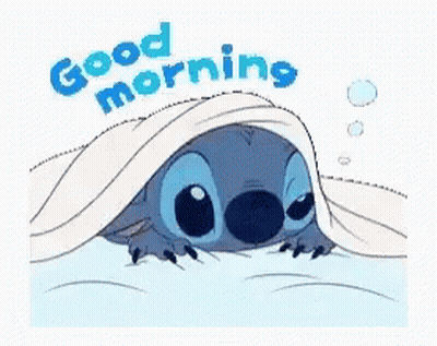 A Cartoon Of Stitch Peeking Out From Under A Blanket With The Words `` Good Morning '' . GIF