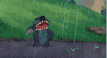 A Cartoon Of Stitch Standing In The Rain GIF