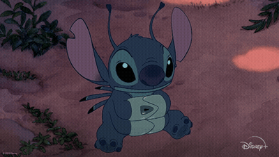 A Cartoon Of Stitch With The Words " Ohana Means Family " Below Him GIF