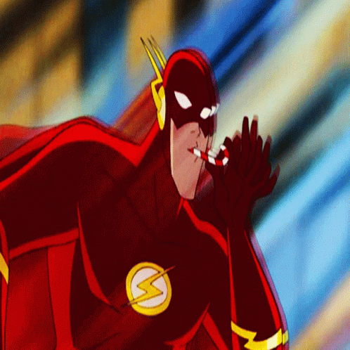 A Cartoon Of The Flash Holding A Candy Cane GIF