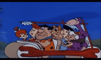 A Cartoon Of The Flintstones Driving A Car GIF