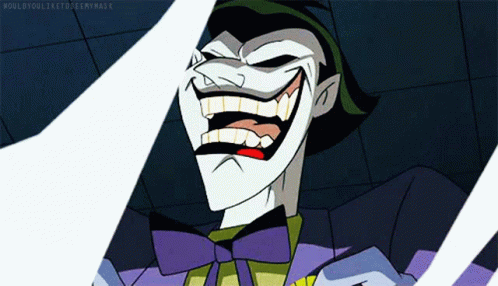 A Cartoon Of The Joker Laughing With The Words Would You Like To See My Face Below Him GIF
