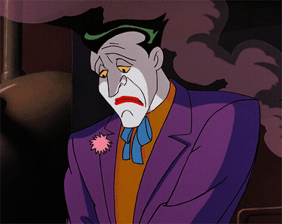 A Cartoon Of The Joker With A Sad Face GIF