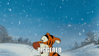 A Cartoon Of Tigger Standing In The Snow With The Word Tiggered Above Him GIF