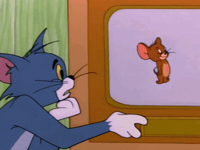 A Cartoon Of Tom And Jerry Looking At Each Other On A Television Screen GIF