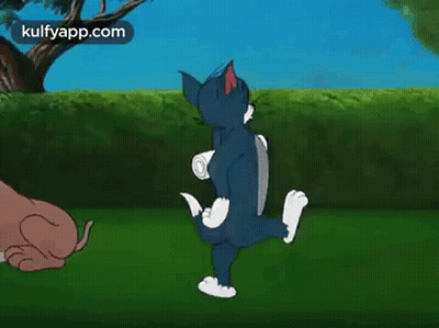 A Cartoon Of Tom And Jerry Playing With A Dog . GIF