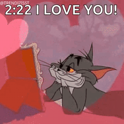 A Cartoon Of Tom Looking At Himself In A Mirror And Saying `` 2:22 I Love You '' . GIF