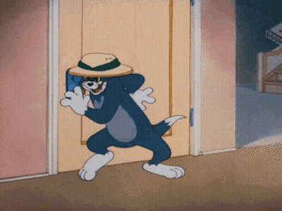 A Cartoon Of Tom Wearing A Hat And Sunglasses Standing In A Doorway GIF