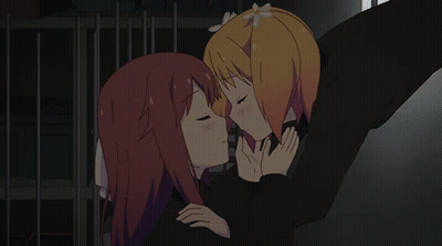 A Cartoon Of Two Girls Kissing With Their Eyes Closed GIF