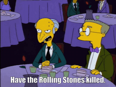 A Cartoon Of Two Men Sitting At A Table With The Words Have The Rolling Stones Killed Below Them GIF