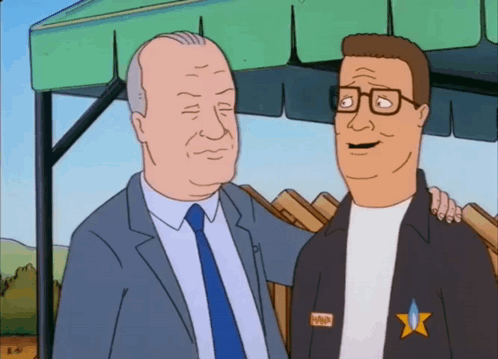 A Cartoon Of Two Men Standing Next To Each Other With One Wearing A Badge That Says King Of The Hill GIF