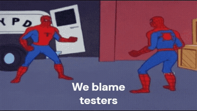 A Cartoon Of Two Spider-Man Standing Next To Each Other With The Words " We Blame Testers " On The Bottom GIF