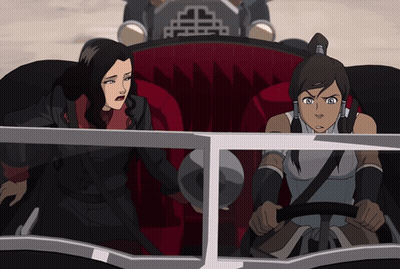 A Cartoon Of Two Women In A Car With A Chinese Symbol On The Side GIF