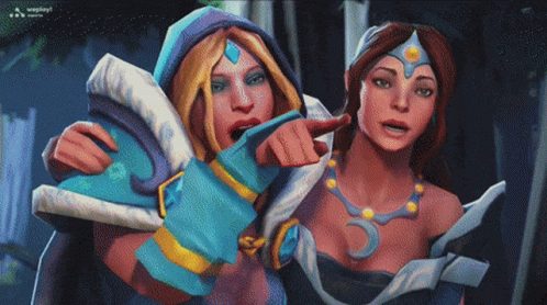 A Cartoon Of Two Women Standing Next To Each Other One Pointing GIF