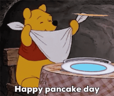 A Cartoon Of Winnie The Pooh Holding A Towel Around His Neck While Holding A Pancake . GIF