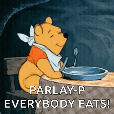 A Cartoon Of Winnie The Pooh Sitting At A Table With A Bowl Of Food And A Spoon In His Mouth . GIF