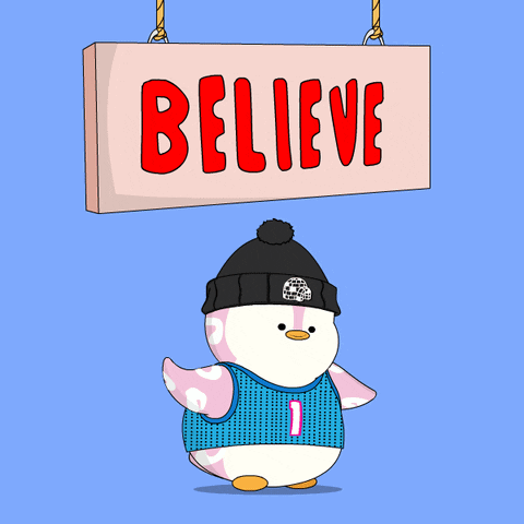 Cartoon Penguin Holding Believe Sign GIF